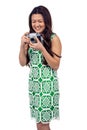 Asian woman holding digital camera Royalty Free Stock Photo