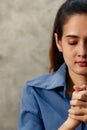Asian woman holding hands To ask for and pray from God On the day of Christ`s church in every week. Concept believe faith prayer Royalty Free Stock Photo