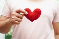 Asian woman holding human internal organ model, donation charity volunteer concept