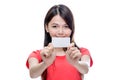 Asian woman holding up blank business card Royalty Free Stock Photo