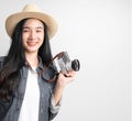 Asian woman holding vintage camera with copy space. Royalty Free Stock Photo