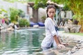 Asian Woman In Hotel Swimming Pool Relaxing Vacation Travel, Young Girl Enjoying Spa Royalty Free Stock Photo