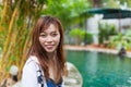 Asian Woman In Hotel Swimming Pool Relaxing Vacation Travel, Young Girl Enjoying Spa Royalty Free Stock Photo