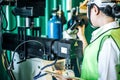 Asian woman is industrial engineer or QC team holding the clipboard Royalty Free Stock Photo