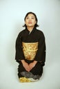 Asian woman in a kimono Royalty Free Stock Photo