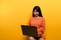 woman and laptop and are happy to work Photo of a beautiful Asian woman who is happy working at home. using a laptop Royalty Free Stock Photo