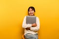 woman and laptop and are happy to work Photo of a beautiful Asian woman who is happy working at home. using a laptop Royalty Free Stock Photo