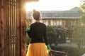 Asian woman looking at view enjoying sunlight