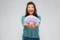 Asian woman with money banknotes of thousands euro Royalty Free Stock Photo