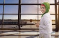 Asian woman muslim holding the phone Royalty Free Stock Photo