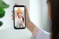 Asian woman patient make video call counseling doctor about healthcare by mobile phone, Telemedicine, Pharmacist Royalty Free Stock Photo