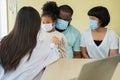 Asian woman pediatrician doctor hold stethoscope for exam a little girl patient and heck heart lungs of kid, Good family doctor Royalty Free Stock Photo