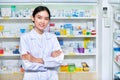 Asian woman pharmacist, chemist woman standing in pharmacy Royalty Free Stock Photo