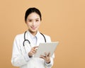 asian woman pharmacist doctor with tablet