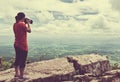 Asian woman photographed the beautiful view, outdoor on summer d Royalty Free Stock Photo