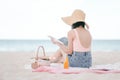 Asian woman Picnic on the beach