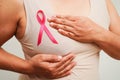 Asian woman with pink ribbon, World Breast Cancer Day at October
