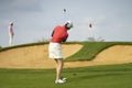 Asian woman playing golf outdoors in course in summer Royalty Free Stock Photo