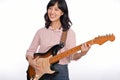 Asian woman playing a vintage sunburst electric guitar  on white background Royalty Free Stock Photo