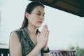 Asian woman praying morning outdoor, Hands folded in prayer concept for faith, spirituality and religion, Church services online