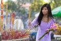 Asian woman praying at temple Royalty Free Stock Photo