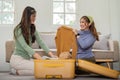 Asian woman prepare to pack clothes travel places with her friends. Asian beautiful two women friend pack things in your Royalty Free Stock Photo