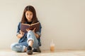 Asian woman reading a book vintage style. Royalty Free Stock Photo