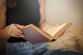 Asian woman reading a book vintage style. Royalty Free Stock Photo