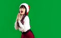 Asian woman in red and white clothes wear santa hat posing surprised face Royalty Free Stock Photo