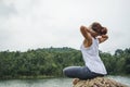 Asian women relax in the holiday. In the natural atmosphere, mountain forest