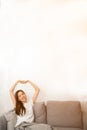 Asian woman relaxed and resting breathing fresh on sofa. Royalty Free Stock Photo