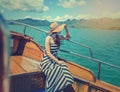 Asian woman relaxing on cruise with sunny day. Royalty Free Stock Photo