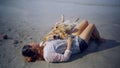 Asian woman relaxing with dog on the beach. Golden Retriever recreation and lifestyle on summer Royalty Free Stock Photo