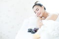 An Asian woman resting in the spa. Woman relaxing in bed spa Royalty Free Stock Photo