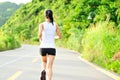 Asian woman runner running outdoor