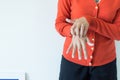 Asian woman scratch itch skin with her hand,Itching and scratching Royalty Free Stock Photo