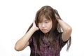 Asian woman scratching itchy head with frustrate face expression Royalty Free Stock Photo