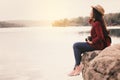 Asian woman shooting picture in nature Royalty Free Stock Photo