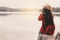 Asian woman shooting picture in nature Royalty Free Stock Photo