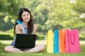 Asian woman shopping online with credit card Royalty Free Stock Photo