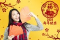 Asian woman showing red envelopes for chinese new year.chinese text happy new year 2020 Royalty Free Stock Photo