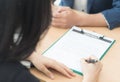 Asian Woman signing on a contract Deal for job or business agreement