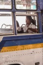 Asian woman sitting in the bus, side view. Locals of Bangkok. Local people of Asia.