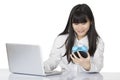 Asian woman sitting at desk stressed on white backgroun Royalty Free Stock Photo