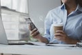 Asian woman sitting in startup company office, businesswoman, executive and investor in business and stocks, management of young Royalty Free Stock Photo