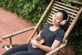 woman listen online music in park after running Royalty Free Stock Photo