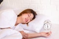 Asian woman sleeping on the bed and grinding teeth,Female bruxism