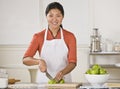 Asian woman slicing apples. Royalty Free Stock Photo