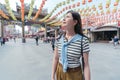 Asian woman smiling and looking upward. Royalty Free Stock Photo