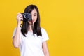 Asian woman smiling pretty girl in white shirt taking photo on camera Royalty Free Stock Photo